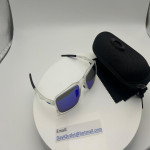 Oakley Unisex Polarized Polished Clear Frame Sunglasses Blue Lenses